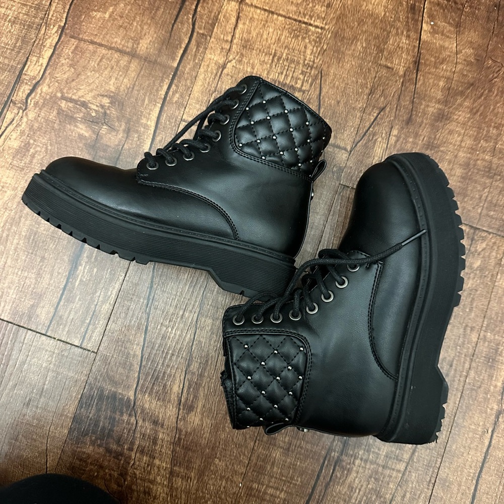 Black Quilted Leather Boots with Lace-Up Design